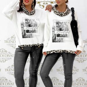 Top with leopard print, hooded neckline, tie at bottom, dandelion pattern