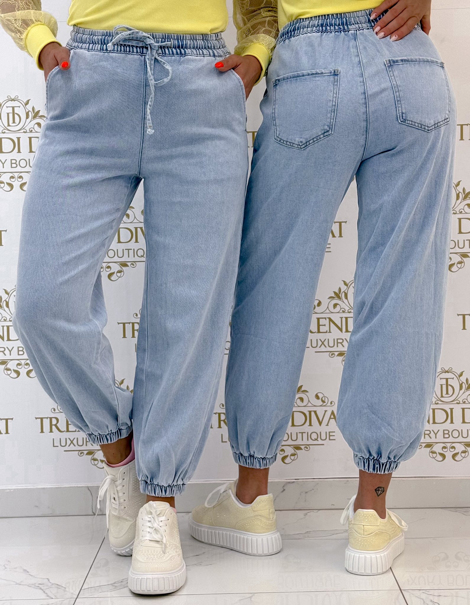 Gumis derekú és aljú, világoskék színű farmernadrág "Q1336-6"